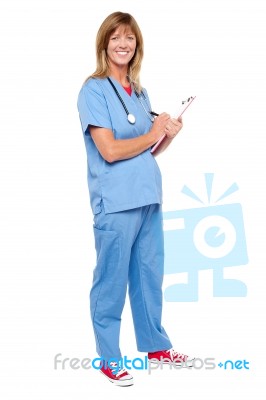 Medical Practitioner Writing Patient's Case History Stock Photo