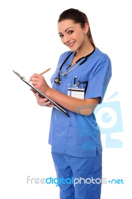 Medical Professional Writing Case History Stock Photo