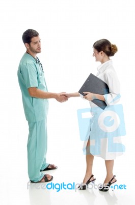 Medical Professionals Shaking Hands Stock Photo