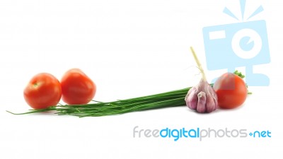 Mediterranean Food Ingredients: Spring Onions, Garlic And Tomato… Stock Photo