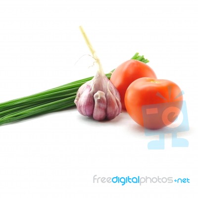 Mediterranean Food Ingredients: Spring Onions, Garlic And Tomato… Stock Photo