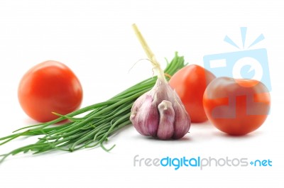 Mediterranean Food Ingredients: Spring Onions, Garlic And Tomato… Stock Photo