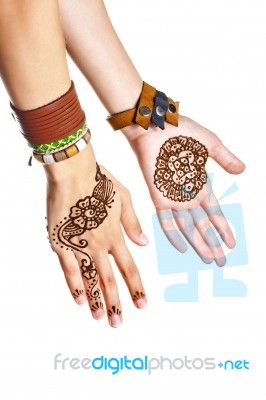 Mehendi Or Henna Tatoo On The Female Hands In Bracelets Isolated… Stock Photo