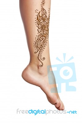 Mehendi Or Henna Tatoo On The Female Leg In Bracelets Isolated O… Stock Photo