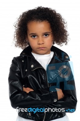 Melancholic Girl Posing With Crossed Arms Stock Photo