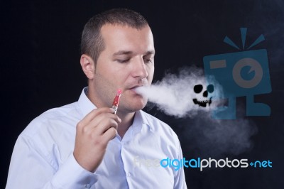 Men Smoke An Electronic Cigarette Stock Photo