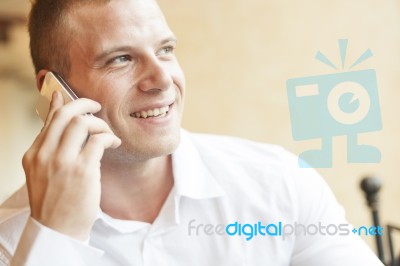 Men Speaking On Smartphone Stock Photo