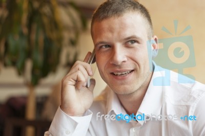 Men Speaking On Smartphone Stock Photo