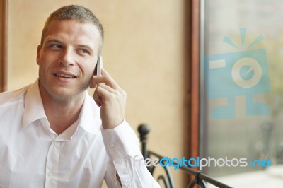 Men Talking On Phone Stock Photo