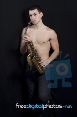 Men With Saxophone Stock Photo