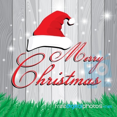 Merry Christmas And Santa's Cap On White And Grey Wooden Background. Christmas Tree On Grey Lath Boards Background Stock Image