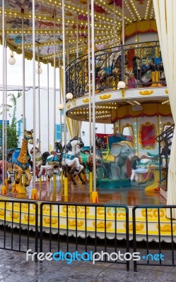 Merry Go Round In Amusement Park Stock Photo