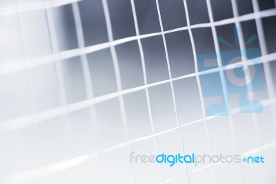 Metal Net Fence Background Stock Photo