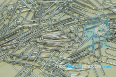 Metal Paperclips Background Stock Photo