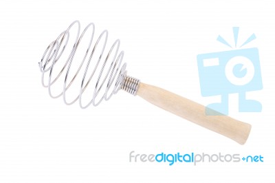 Metallic Spring Whisk On White Background Stock Photo