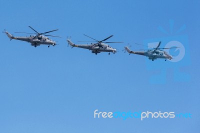 Mi-24 Attack Helicopters Fly On Military Parade Devoted To 70th Stock Photo