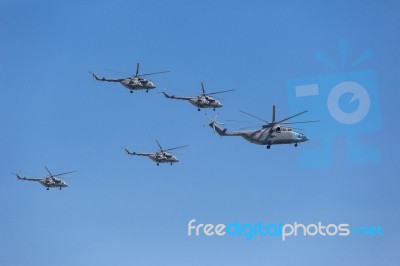 Mi-26 (halo) And Mi-8amtk (hip) Helicopters Fly On Military Para… Stock Photo