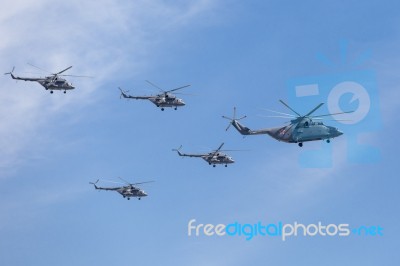 Mi-26 (halo) And Mi-8amtk (hip) Helicopters Fly On Military Para… Stock Photo