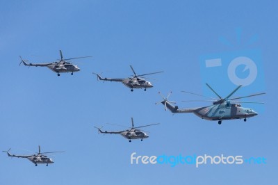 Mi-26 (halo) And Mi-8amtk (hip) Helicopters Fly On Military Para… Stock Photo