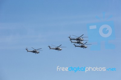 Mi-28n (havoc) Attack Helicopters Of Aerobatic Team Berkuty Fly Stock Photo