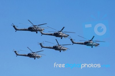 Mi-28n (havoc) Attack Helicopters Of Aerobatic Team Berkuty Fly Stock Photo