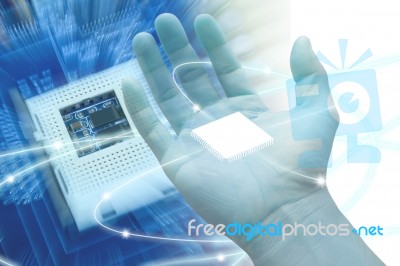 Microchip In Hand Stock Photo