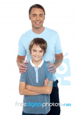 Middle Aged Father Posing With His Smart Son Stock Photo