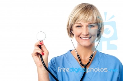 Middle Aged Female Doctor With A Stethoscope Stock Photo