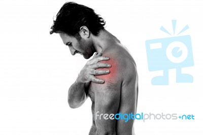 Middle Aged Man Having Shoulder Ache Stock Photo