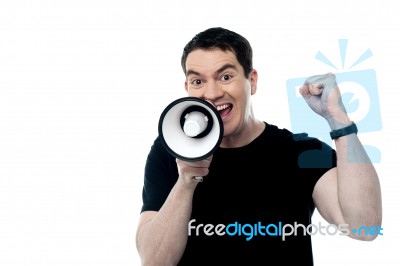 Middle Aged Man Posing With Megaphone Stock Photo