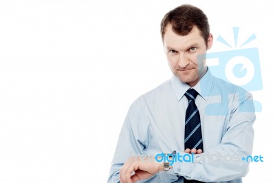 Middle Aged Manager Checking His Watch Stock Photo