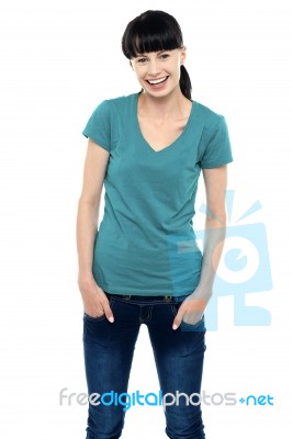 Middle Aged Smiling Woman In Casual Wear Stock Photo