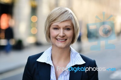 Middle Aged Woman Outside The Office Stock Photo