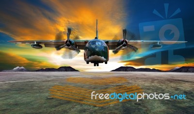 Military Plane Landing On Airforce Runways Against Beautiful Dus… Stock Photo