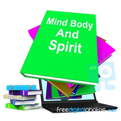 Mind Body And Spirit Book Stack Laptop Shows Holistic Books Stock Image