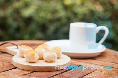 Mini Chinese Cakes On Wooden Plate Stock Photo