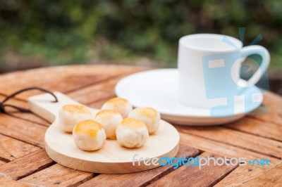 Mini Chinese Cakes On Wooden Plate Stock Photo