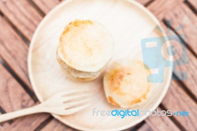 Mini Pies On Wooden Plate Stock Photo