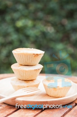 Mini Pies On Wooden Plate Stock Photo