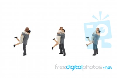 Miniature Couple Hugging Stock Photo