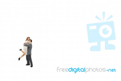 Miniature Couple Hugging Stock Photo