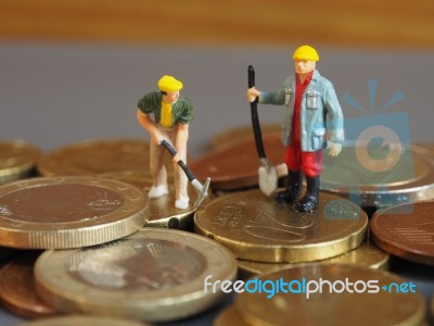 Miniature Worker People Stand On Euro Coins. Business And Idea C… Stock Photo