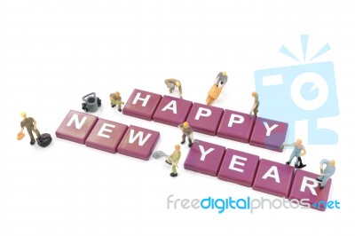 Miniature Worker Team Building Word Happy New Year Stock Photo