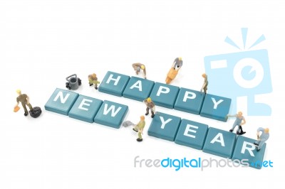 Miniature Worker Team Building Word Happy New Year Stock Photo