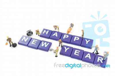 Miniature Worker Team Building Word Happy New Year Stock Photo