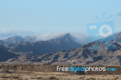 Mist Clearing On The Mountains Stock Photo