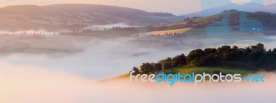 Misty Dawn In Tuscany Stock Photo