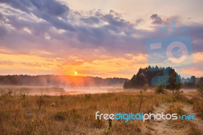 Misty Summer Sunrise. Foggy River In The Morning. Misty Morning Stock Photo