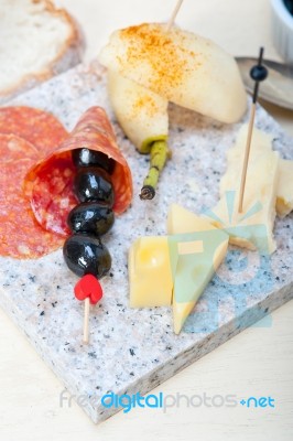 Mix Cold Cut On A Stone With Fresh Pears Stock Photo