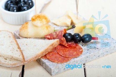 Mix Cold Cut On A Stone With Fresh Pears Stock Photo